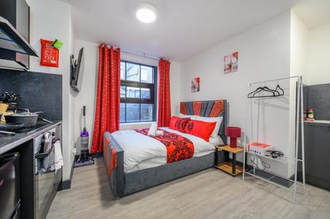 Bed, View (from property/room), Bedroom, stove, towels, washing machine, kitchen