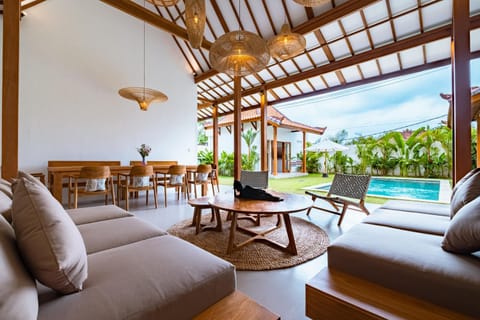 View (from property/room), Balcony/Terrace, Living room, Seating area, Swimming pool