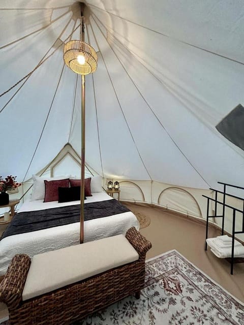 Enchanting Mountain Glamping Tents with Elevated Decks and Fire Pit Near Gentry, AR Luxury tent in Arkansas
