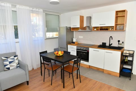 Dining area, dishwasher, oven, stove, kitchen