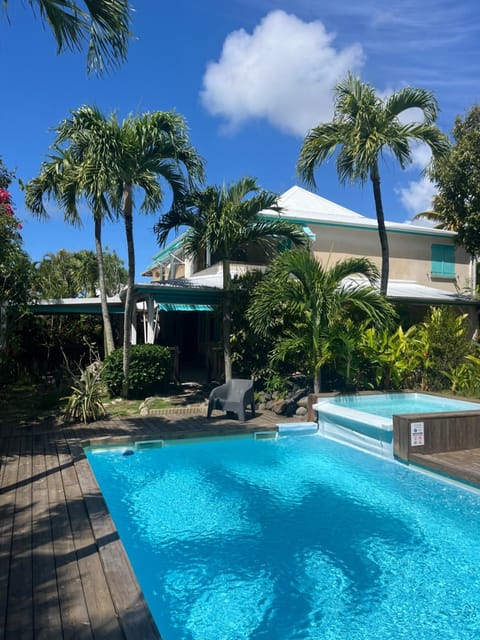 Property building, Patio, Day, Garden, View (from property/room), Garden view, Pool view, Swimming pool, sunbed