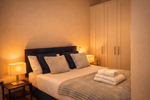 Bed, Photo of the whole room, Bedroom, towels, wardrobe