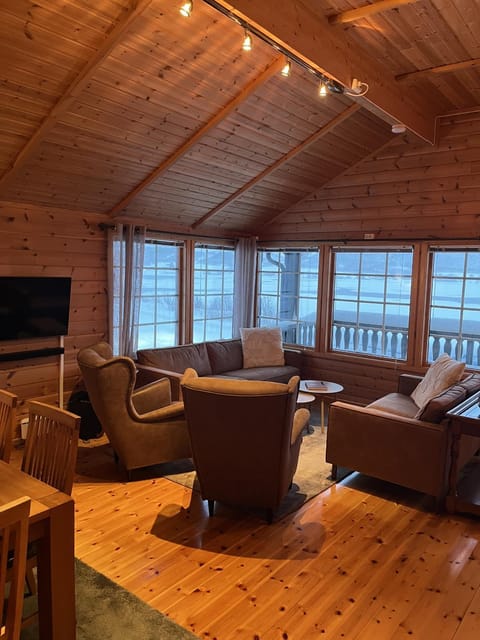 TV and multimedia, View (from property/room), Living room, Seating area, Sea view