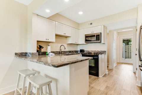 Golf course-adjacent home with shuffleboard table & furnished patio House in Lower Grand Lagoon