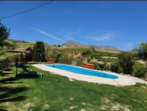 Property building, Living room, Swimming pool