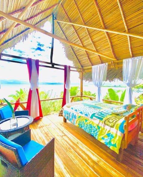 Bed, Natural landscape, View (from property/room), Seating area, Bedroom, Garden view