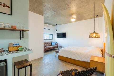 Bed, Living room, Seating area, Bedroom