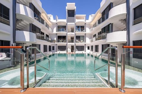Property building, Day, Pool view, Swimming pool