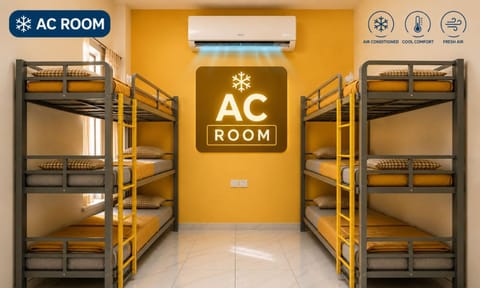 Photo of the whole room, bunk bed, air conditioner