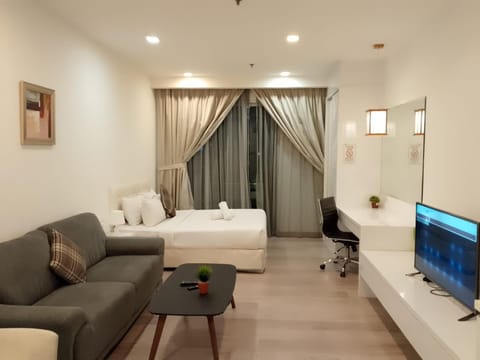 Bed, TV and multimedia, Seating area, Bedroom, hair dresser