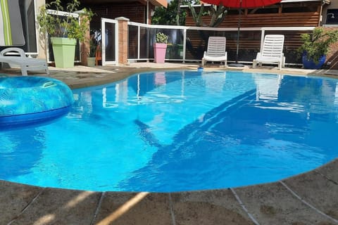 Swimming pool, sunbed