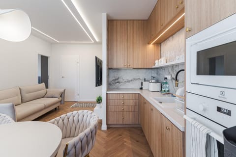 Kitchen or kitchenette, Living room, Seating area, dishwasher, oven, stove, toaster