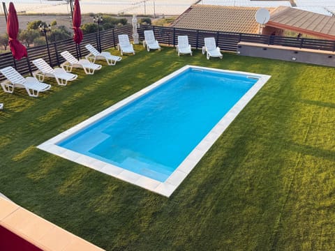 Property building, Living room, Swimming pool