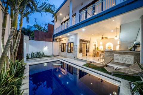 Property building, Patio, Pool view, Swimming pool, sunbed
