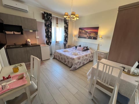 Photo of the whole room, Dining area, towels, air conditioner