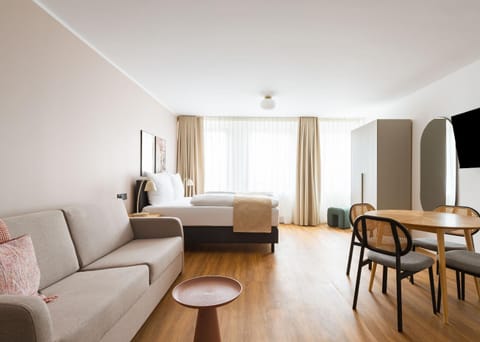 Bed, Seating area, Bedroom