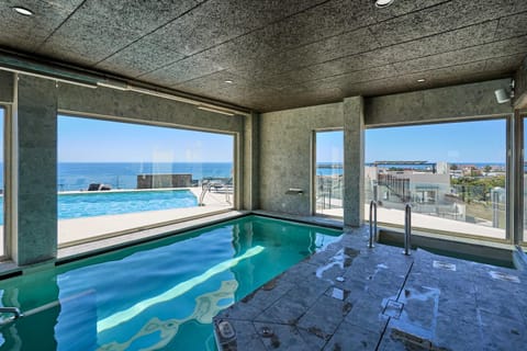 Property building, Living room, Swimming pool