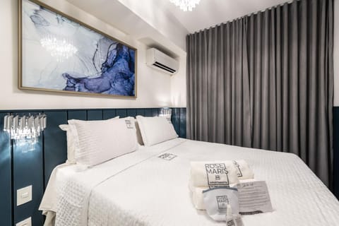 Bed, Photo of the whole room, Bedroom, towels, air conditioner