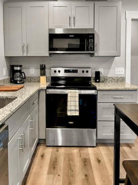 Kitchen or kitchenette, oven, stove, toaster