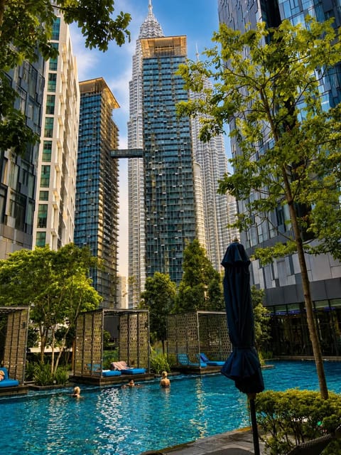 Property building, Day, Natural landscape, City view, Pool view, Swimming pool, sunbed