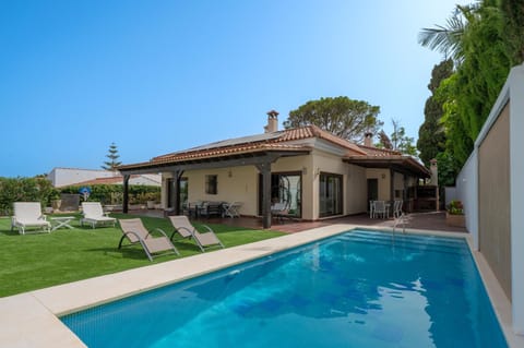 Property building, Patio, Garden, Garden view, Swimming pool