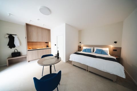 Bed, Living room, Seating area