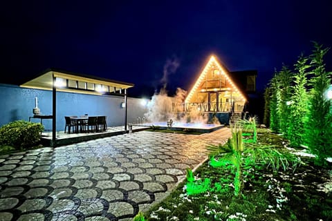 Property building, Patio, Night, Garden, Garden view, Pool view, Swimming pool