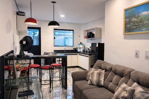Communal lounge/ TV room, TV and multimedia, Living room, Dining area, oven, stove, kitchen