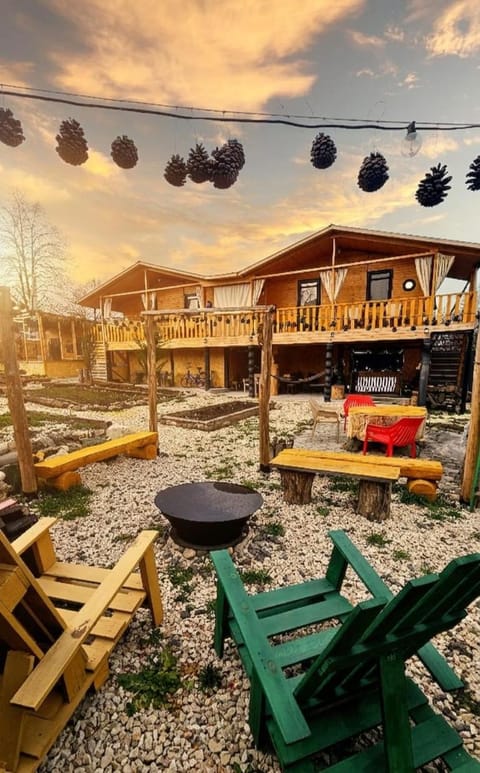 Property building, Patio, Natural landscape, Garden, Seating area