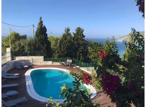 Property building, Living room, Swimming pool
