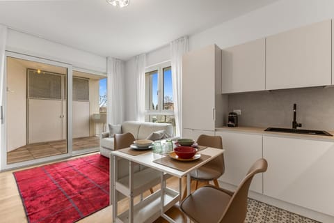 Kitchen or kitchenette, Living room, Seating area, Dining area