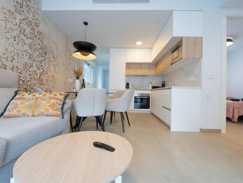 Kitchen or kitchenette, Living room, Seating area, oven, stove