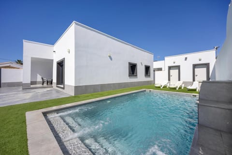 Property building, Living room, Swimming pool