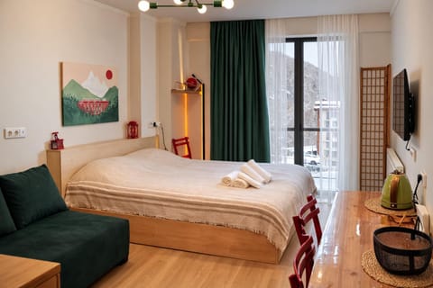 Bed, Winter, View (from property/room), Living room, Photo of the whole room, Seating area, Bedroom, City view, City view, Mountain view, Mountain view