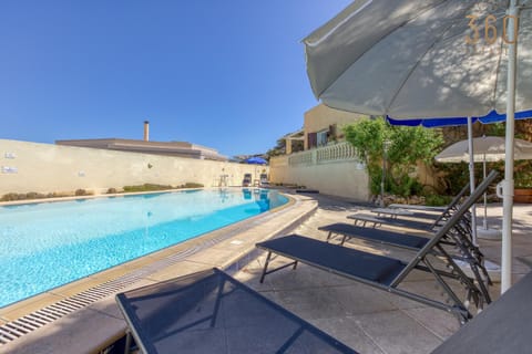 Patio, Day, Pool view, Swimming pool, sunbed