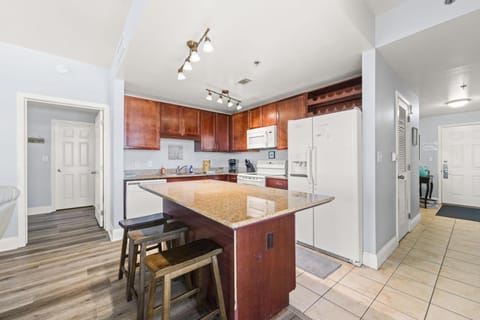 Kitchen or kitchenette, dishwasher, oven, stove