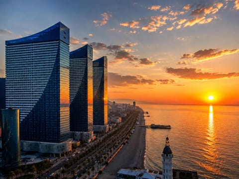 Property building, Nearby landmark, Day, Natural landscape, City view, Sea view, Sunrise, Sunset