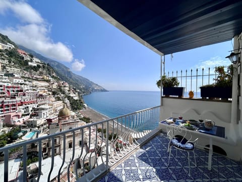 Property building, Patio, Nearby landmark, Day, Natural landscape, View (from property/room), Balcony/Terrace, Dining area, City view, Mountain view, Sea view
