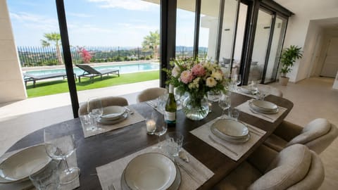 Living room, Dining area, Pool view