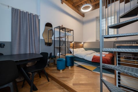 Bed, Living room, Photo of the whole room, Seating area, Bedroom, oven, towels, towels, wardrobe