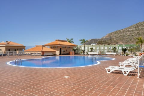 Property building, Living room, Swimming pool