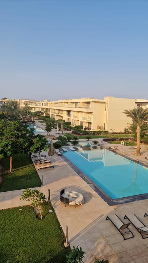 Property building, Pool view, Swimming pool, sunbed