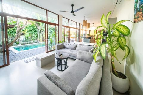 Living room, Seating area, Pool view