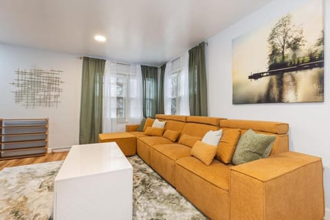 Downtown Naperville Retreat with King bed Near Riverwalk Dedicated Workspace Free Garage Parking Patio Apartment in Naperville