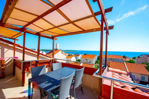 View (from property/room), Balcony/Terrace, Seating area, Sea view