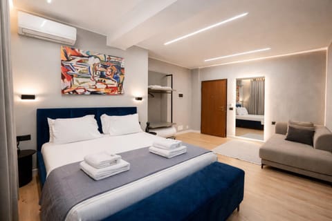 Bed, Living room, Photo of the whole room, Seating area, Bedroom, towels, wardrobe, air conditioner