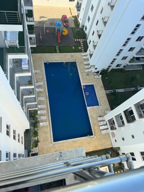 Property building, Day, Pool view, Swimming pool, sunbed