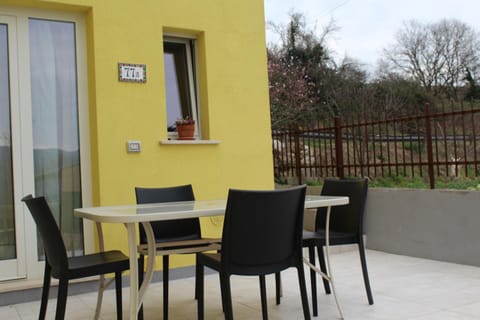 Property building, Patio, Day, View (from property/room), Balcony/Terrace, Living room, Seating area, Dining area