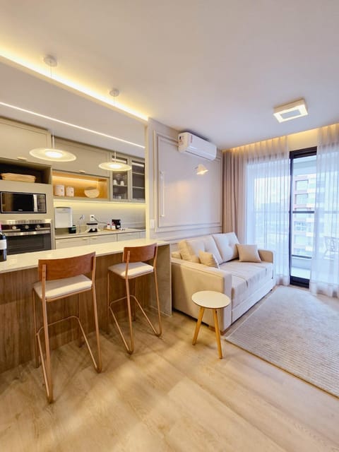 Kitchen or kitchenette, Living room, Seating area, Dining area, stove, air conditioner