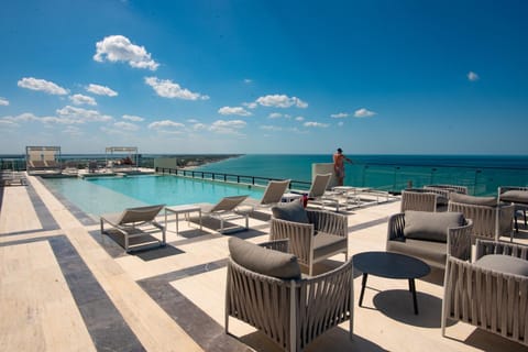 Property building, Natural landscape, View (from property/room), Balcony/Terrace, Seating area, Swimming pool, Swimming pool, sunbed